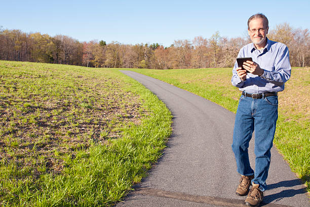 Walking With An EBook stock photo