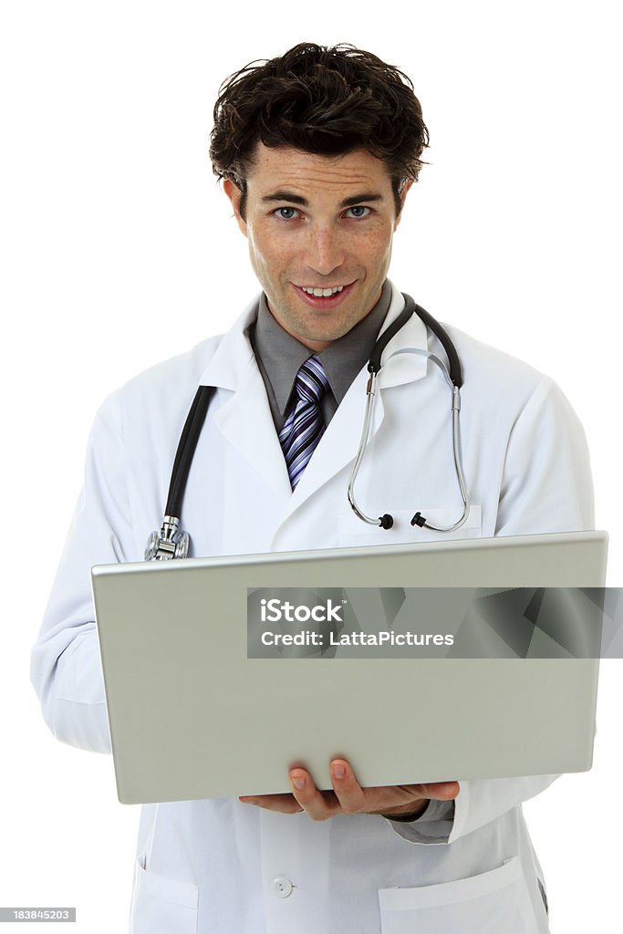 Young Caucasian doctor with laptop looking at camera "Attractive young male doctor wearing stethoscope and holding computer, isolated on white background" 30-39 Years Stock Photo