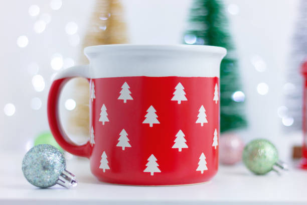 istock close up large red cup with pattern of white Christmas trees on table with Christmas decorations. celebration, holiday 1838463958