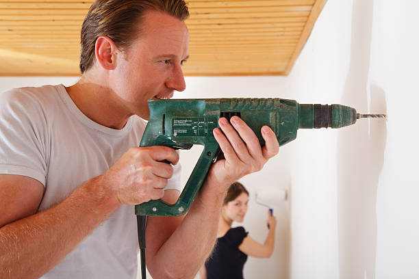 istock young couple working in their new apartment 183846597