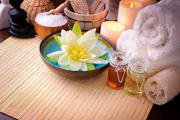 Spa Treatment with copy space Tranquil scene with bath and massage items. XXXL image essential oil photos stock pictures, royalty-free photos & images