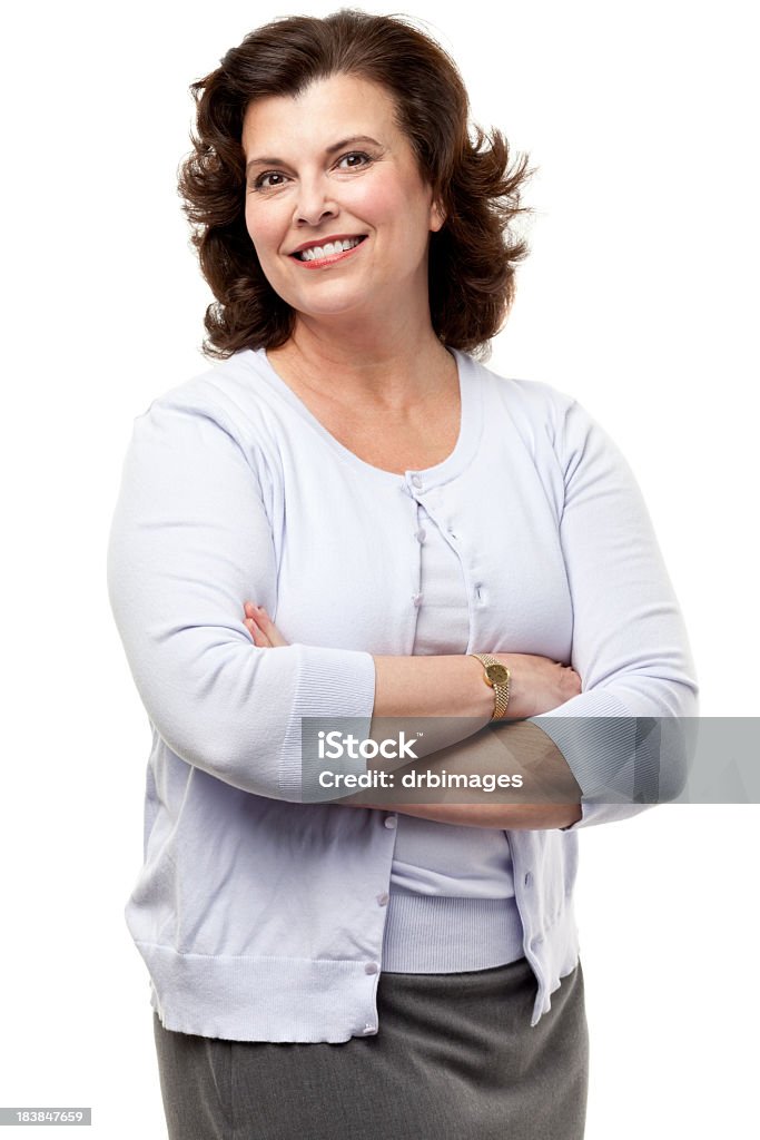 Felice donna sorridente in posa con le braccia incrociate - Foto stock royalty-free di Donne