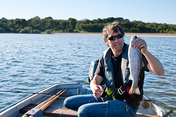 Fly Fishing Success stock photo