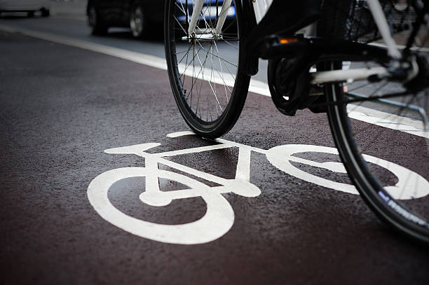 istock Bike lane and traffic 183847812
