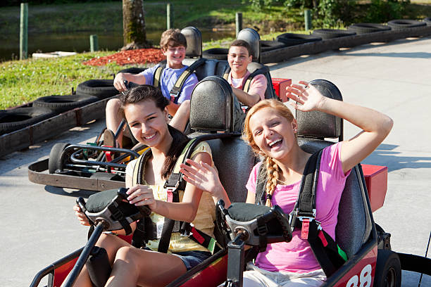 istock Teenagers riding go-carts 183848305