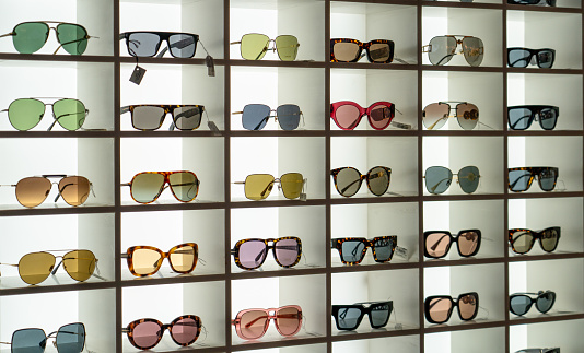 UAE, Dubai- November 11.2023 :Display rack full of various sunglasses.