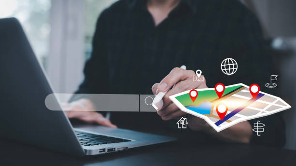 istock Man using Smartphone with virtual world and model map with location point, GPS app, icon Travel maps and find places in the online system, all screen graphics are generated, Searching for travel. 1838504106