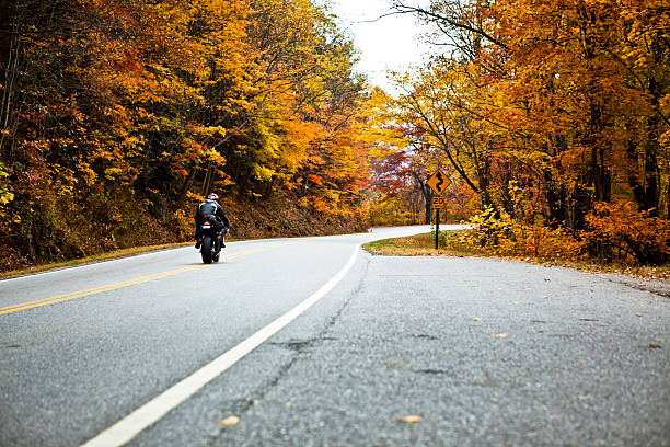 乗馬、twisties - motorcycle biker riding motorcycle racing ストックフォトと画像