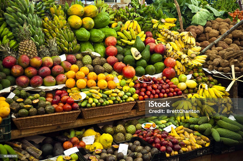 Vegetable Market Colourful fruit and vegetable market stall in a rustic display Fruit Stock Photo
