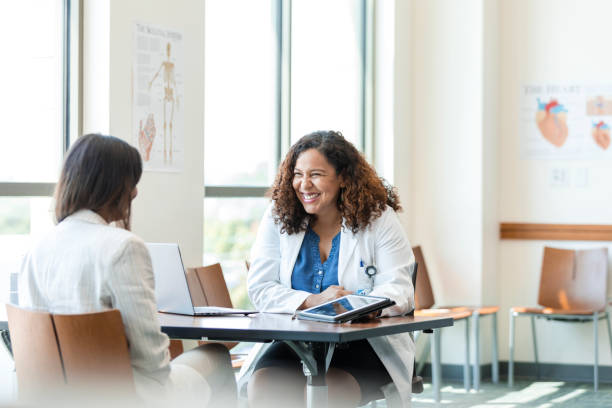 istock Unrecognizable female patient asks her doctor about medication 1838520713