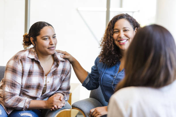 istock Mother smiles proudly while introducing her daughter to the intern coordinator 1838520723