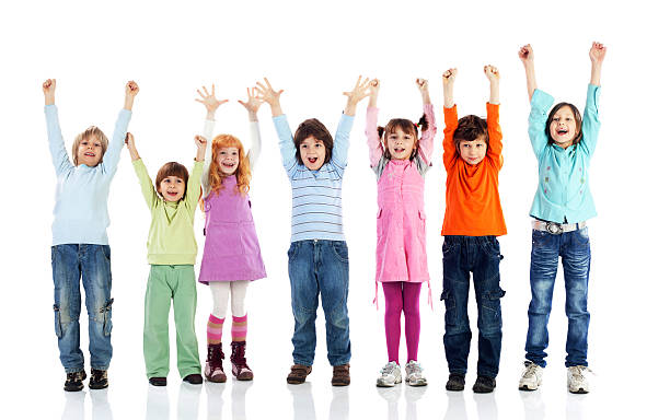 istock Large group of smiling kids standing with their hands raised. 183852379