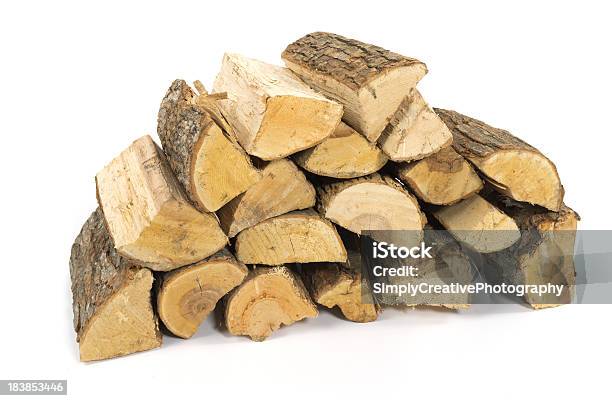 A Stack Of Split Firewood On A White Background Stock Photo - Download Image Now - Firewood, Woodpile, White Background