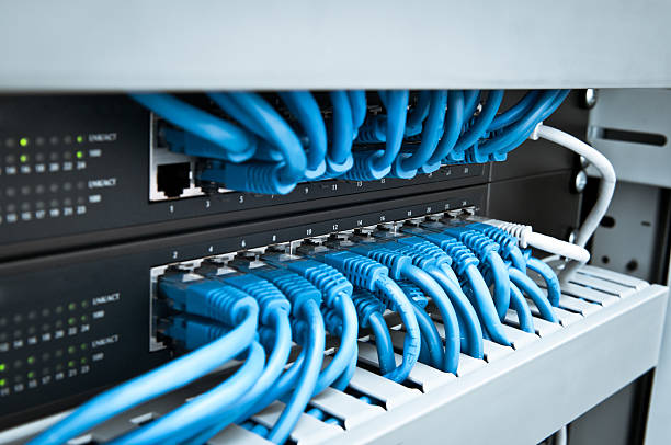 Network hub and cable stock photo