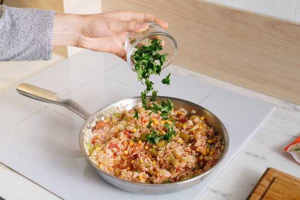 istock Cooking rice with vegetables for lunch 1838542534