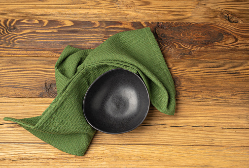 Empty Bowl Mockup, Black Plate on Wooden Table Top View with Copy Space for Text, Rustical Kitchen Mock Up, Empty Bowl with Cloth Napkin Fabric