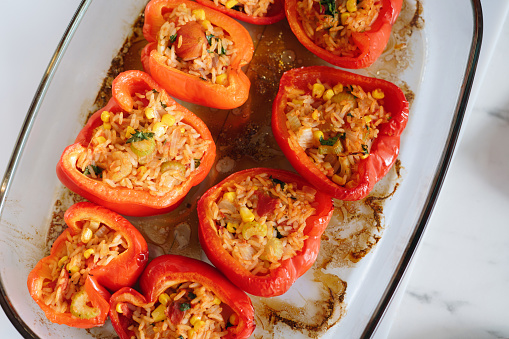Cooking vegetarian stuffed peppers for dinner