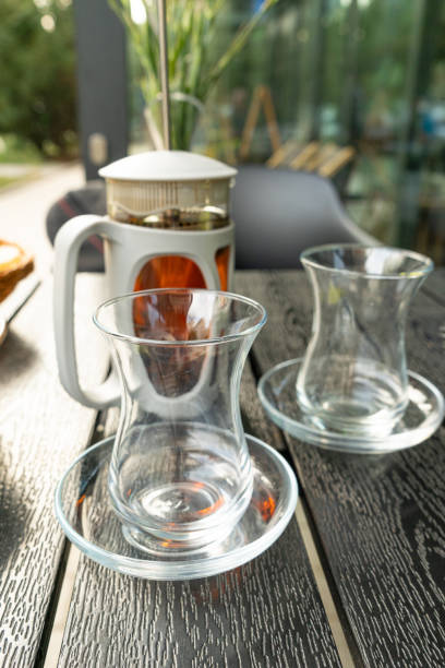 istock Turkish Tea on a Street Cafe Table, Arabic Cup in Restaurant, Black Tea Drinking in Turkish Cup 1838548484