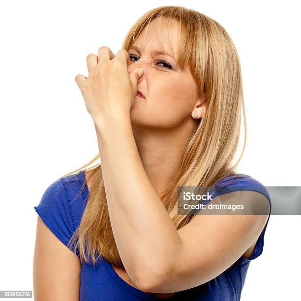 Disgusted Woman Pinches Nose Stock Photo - Download Image Now - Fart, Unpleasant Smell, Women