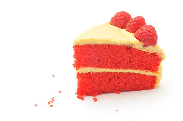 Red cake with icing and three raspberries A slice of home-made lemon and raspberry sponge cake, isolated on a white background. food coloring stock pictures, royalty-free photos & images