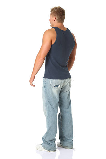 istock Rear view of a muscular man standing 183856302