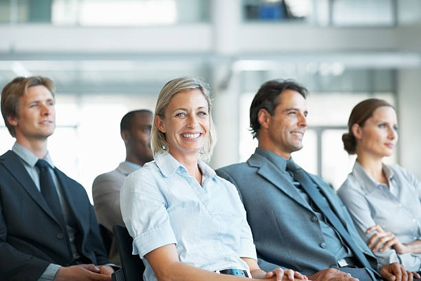 istock Pretty business woman smiling during a presentation 183856910
