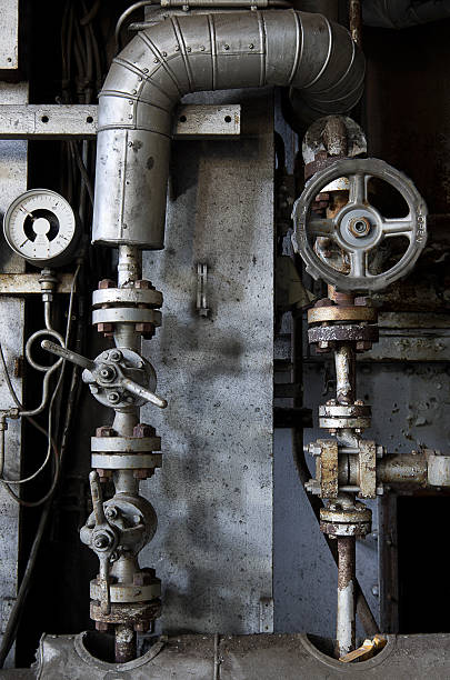 istock Grungy pipes and valves 183857028