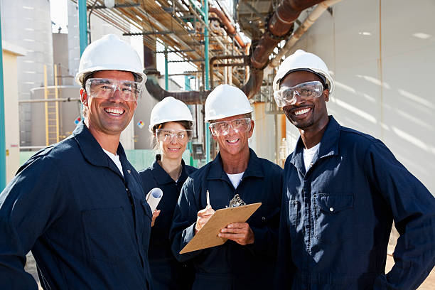 istock Diverse group of workers at manufacturing plant 183857220