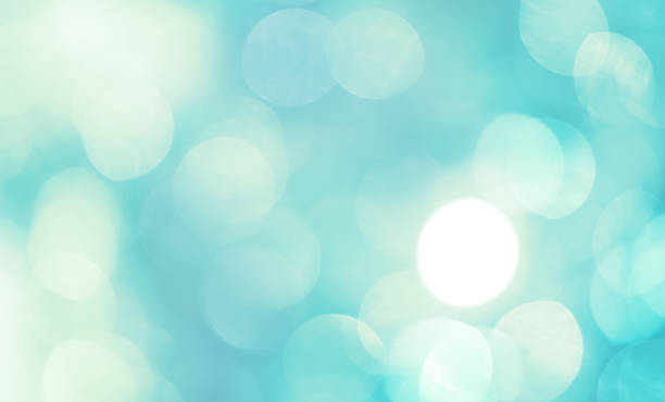 Teal and white abstract defocused light background stock photo