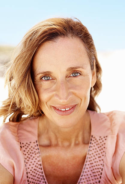istock Attractive, mature woman smiling 183857507
