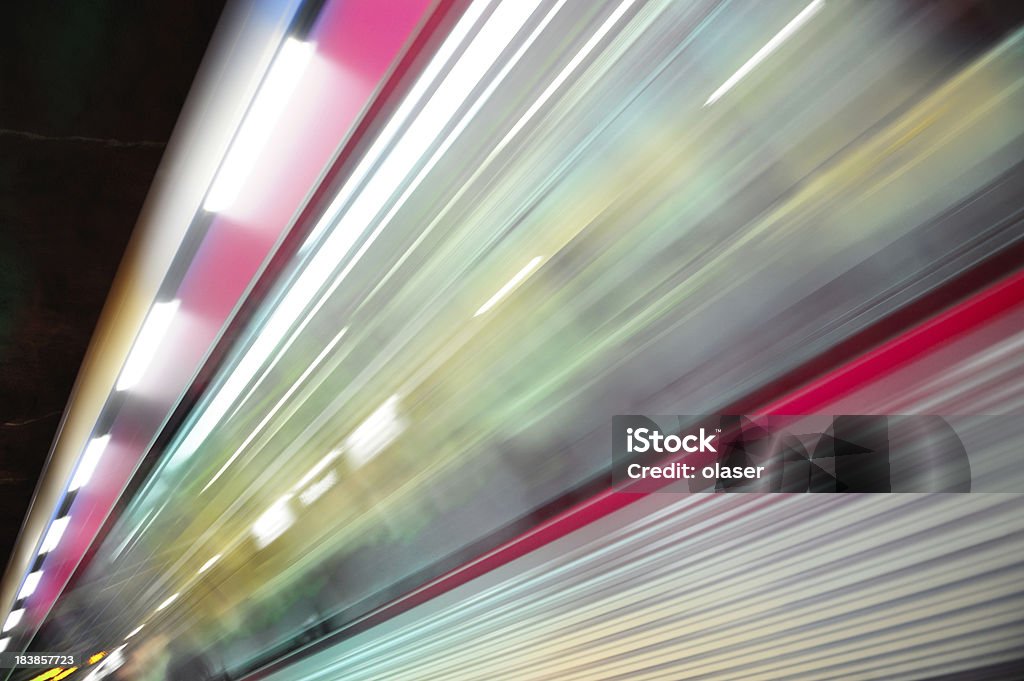 Commuter train, motion blur Exiting train from indoors platform.  Motion blurred, diminishing perspective Abstract Stock Photo