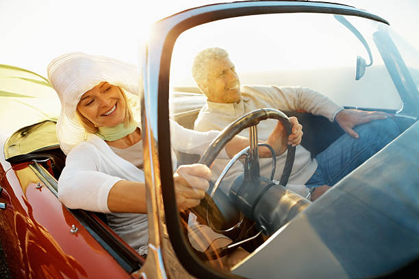 istock Cheerful, mature couple going for a drive 183857743