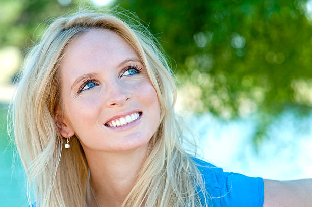 istock Beautiful Blonde Looking Up 183858924