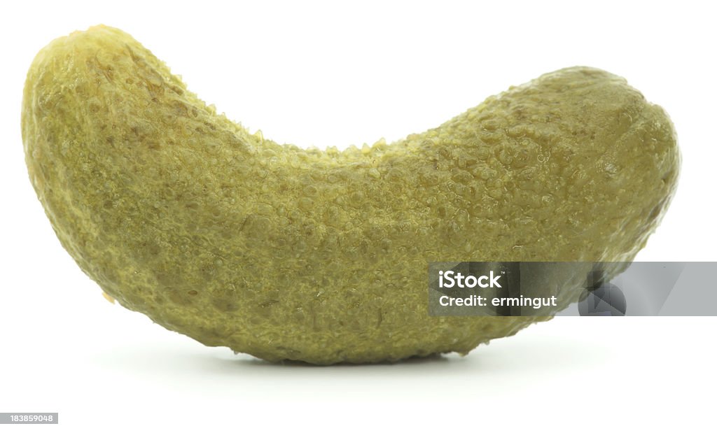 One curved pickle isolated on white Bent Stock Photo