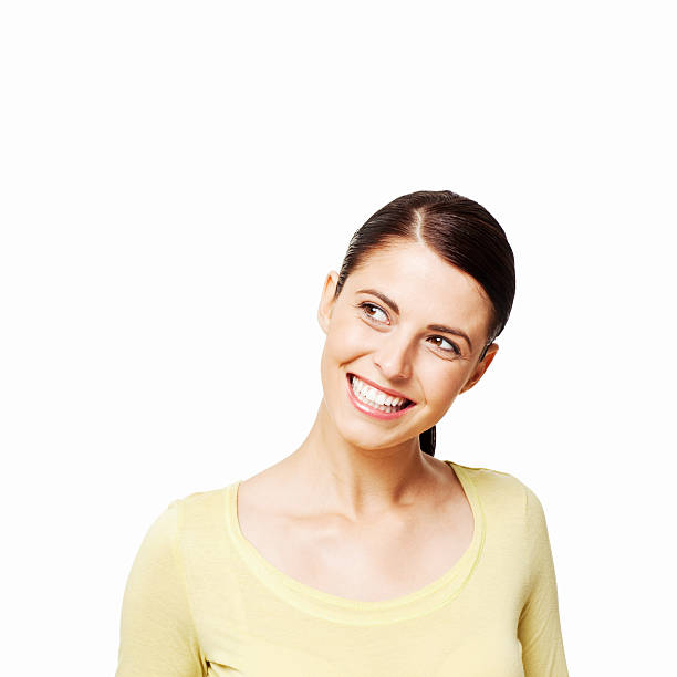 istock Young Woman Smiling to the Side - Isolated 183859105