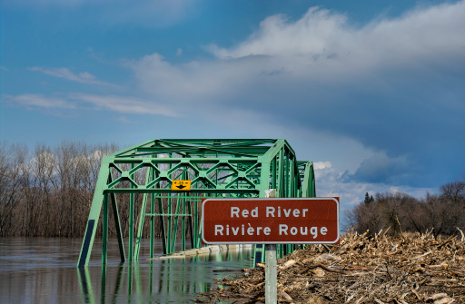 View of a flooded bridge along the Red River.