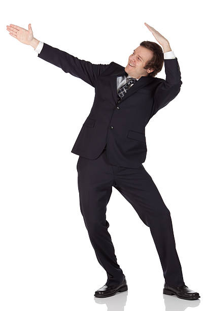 istock Businessman presenting something to the side 183859634