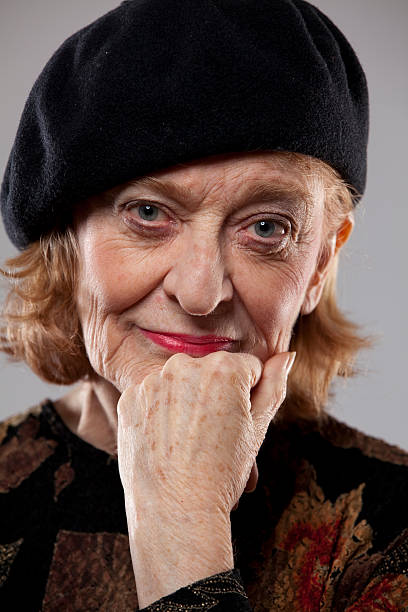 istock thoughtful woman in a beret 183860175