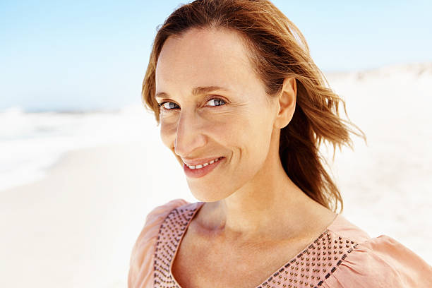 istock Mature woman smiling 183860544