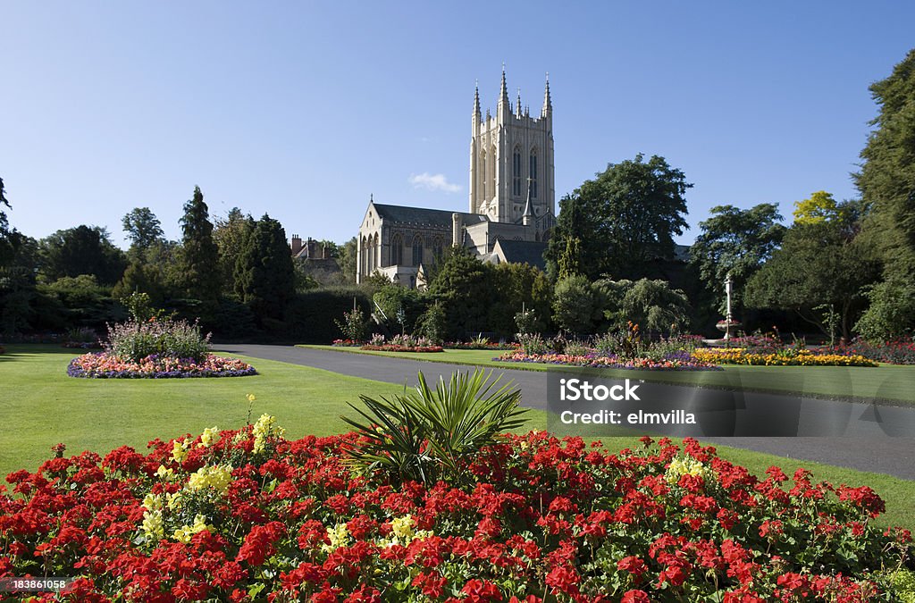 Bury St Edmund Cathedral and Abbey Gardens Bury St Edmunds Cathedral seen from Abbey Gardens full of colourful flower beds Bury St Edmunds Stock Photo