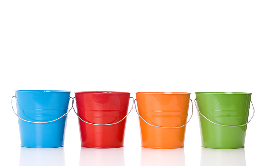 four colorful bucket isolated on white background
