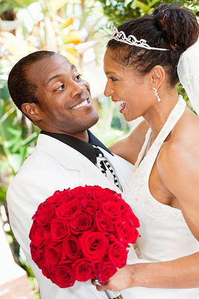istock Newly Wed Couple Smiling and Looking at Each Other 183861185