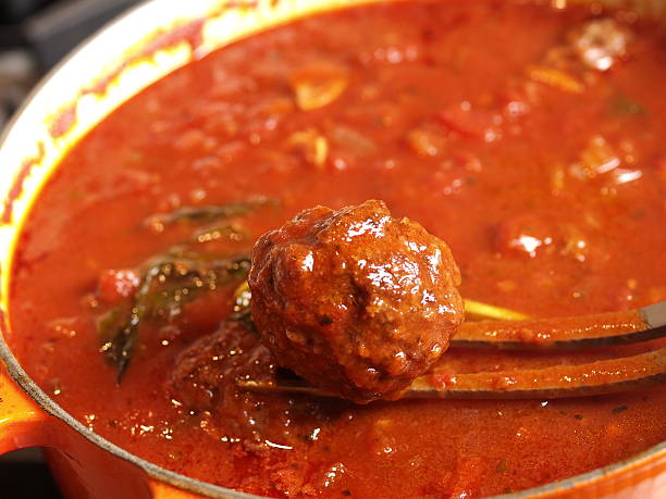 istock Single Meatball above Sauce 183861478