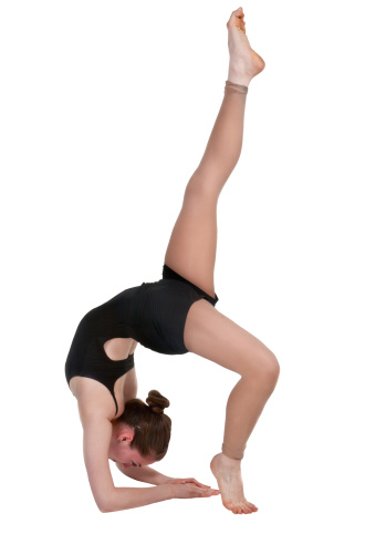 a very flexible young woman  in a very interesting posistion