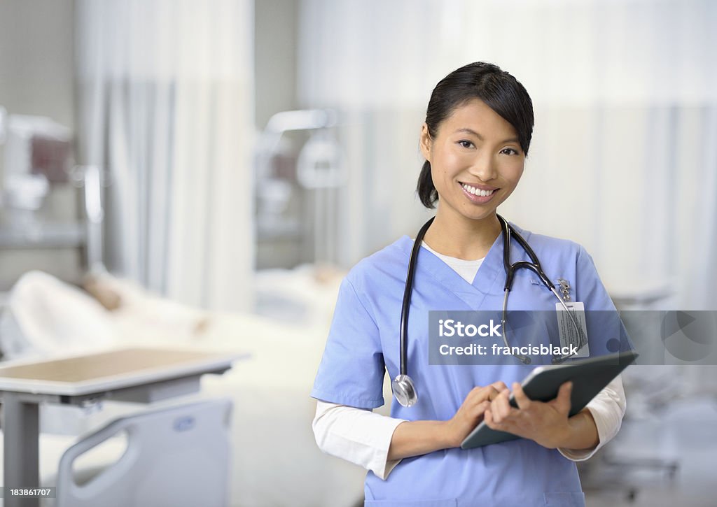 Enfermeira trabalhando - Foto de stock de Adulto royalty-free