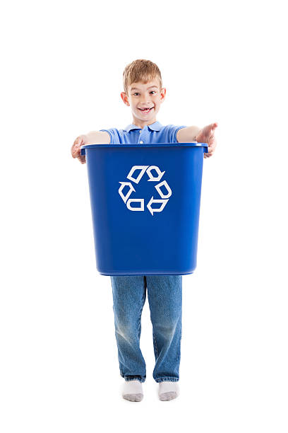 istock Happy Boy Holding Out Recycle Bin Trash Can 183861763
