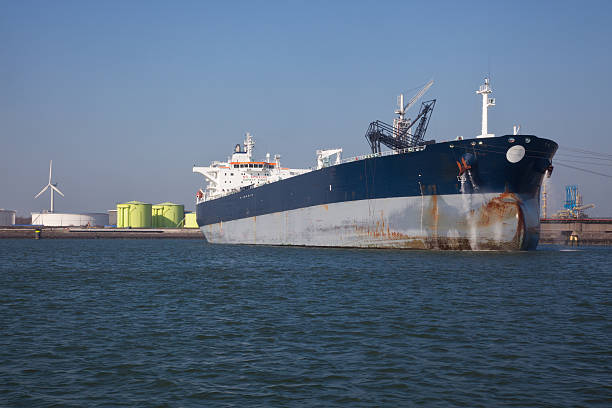 istock Supertanker with oil storage tanks 183862183