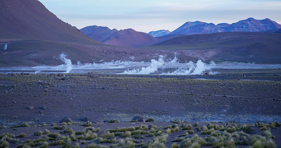El Tatio geyser field in northern Chile at dawn