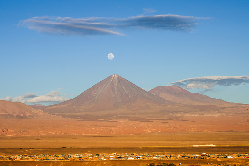 Idyllic Atacama Desert altiplano steppe at gold colored sunset, volcanic landscape panorama – San Pedro de Atacama, Chile