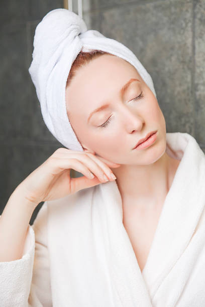 istock Young woman relaxing in the spa 183863498